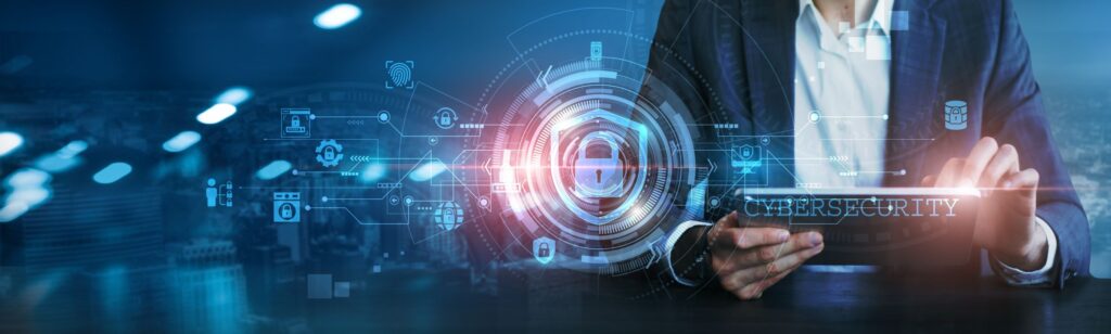 IT consultant in Wales reviewing a cybersecurity report for an SME owner